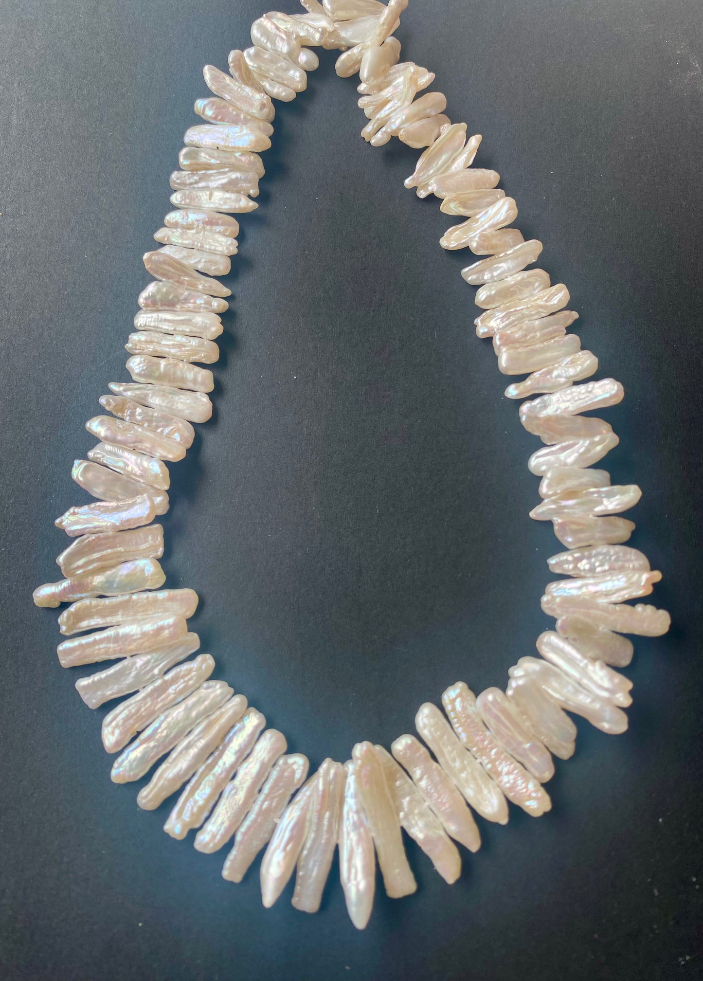Freshwater Baroque pearls with irregular shapes and radiant finish, perfect for statement jewellery.