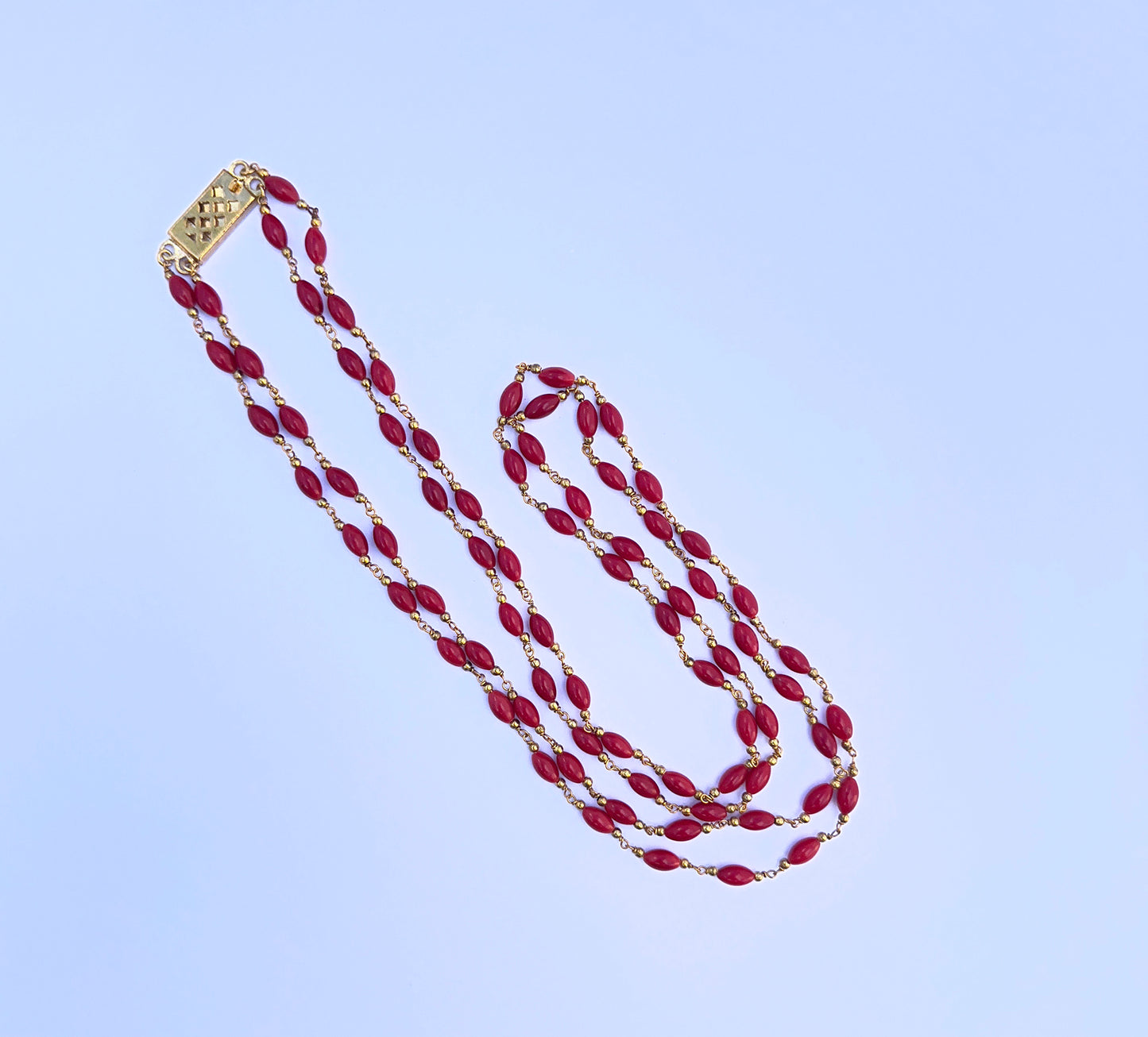 Elegant 2 strand coral necklace crafted from natural gemstone beads, 4mm smooth drum cut, timeless jewellery design.