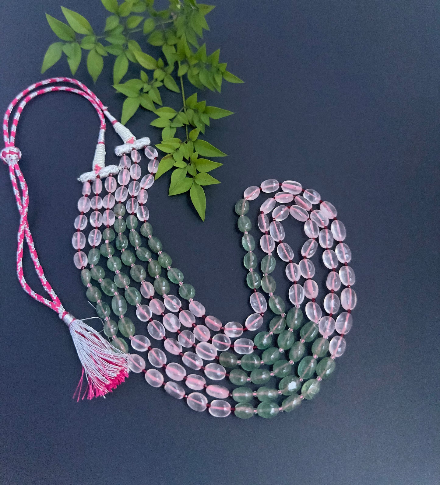 Quartz necklace showcasing natural gemstone beads, smooth oval cut, versatile styling.