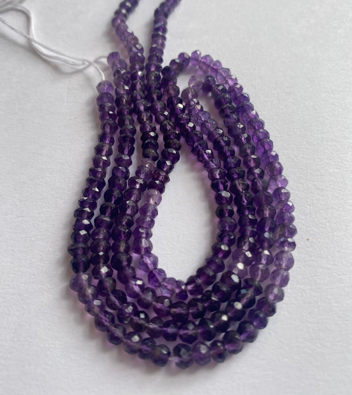 Elegant strand adorned with 4mm to 4.5mm faceted rondelle amethyst stones, showcasing a rich purple colour.