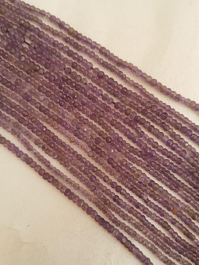 Elegant strands adorned with 2.5mm faceted rondelle amethyst stones, in bulk, showcasing a rich purple colour.