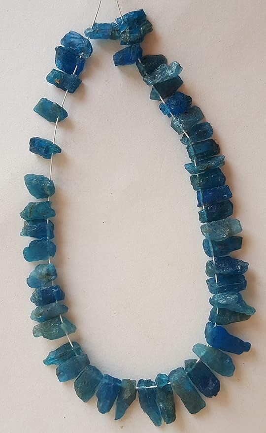 Beautiful blue Apatite Raw Rough Side Drilled Beads measuring between 4mm and 5mm.