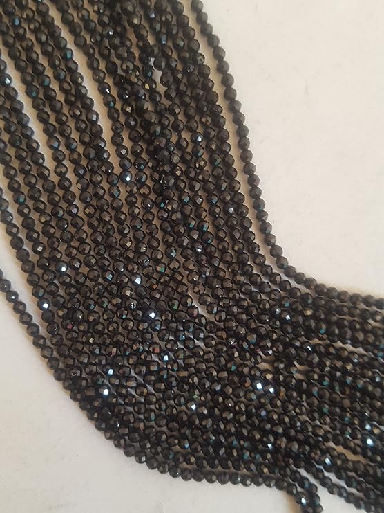 Elegant gemstone strands adorned with 2mm beads highlighting the beauty of black spinel.