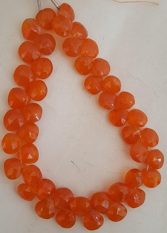 Elegant strand adorned with 8mm Carnelian briolette beads, perfect for adding a pop of colour.