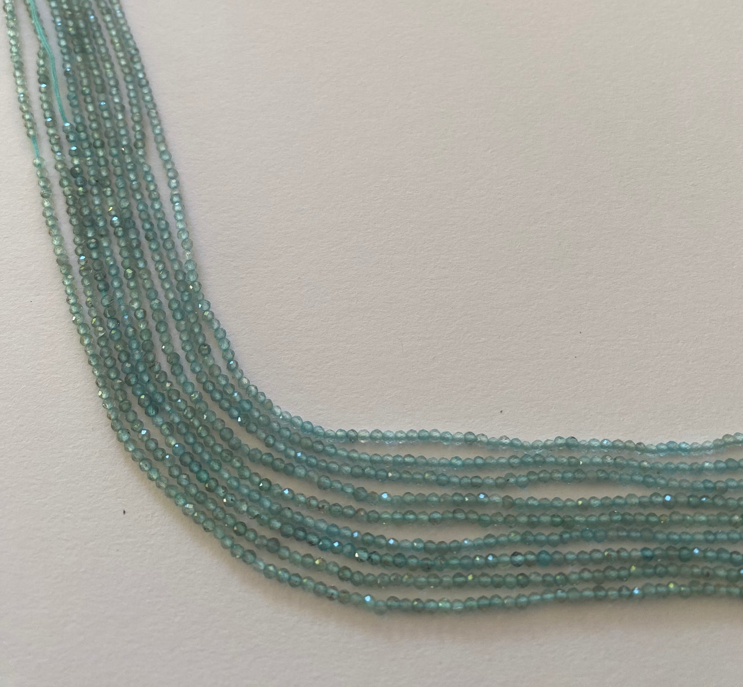 Stylish strands made of 2mm chalcedony faceted rondelle beads, highlighting its sophisticated look.