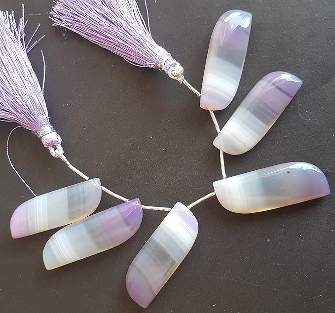 Elegant strand adorned with Chalcedony smooth stones, showcasing a rich purple colour.