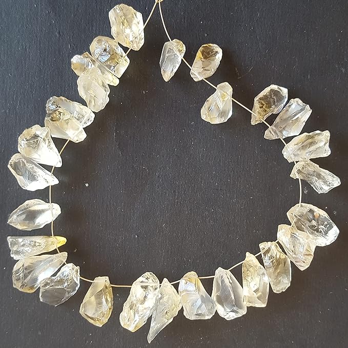 A strand crafted from rough yellow natural citrine gemstone, with beads sized between 9mm and 10mm, radiating warmth and elegance.