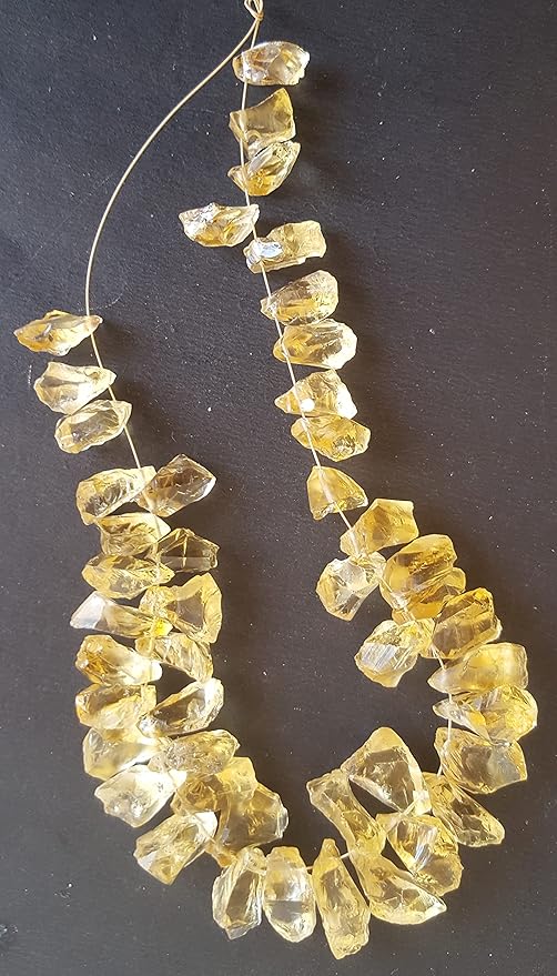 A strand crafted from rough yellow natural citrine gemstone, with beads sized between 7mm and 8mm, radiating warmth and elegance.