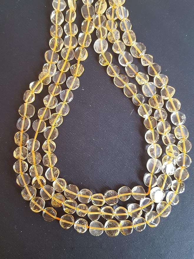 Elegant strands adorned with 6mm to 7mm smooth citrine stones, showcasing a rich colour.