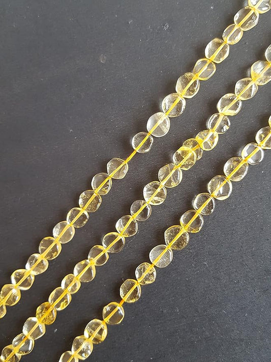Strands featuring smooth Citrine gemstones, ranging from 6mm to 7mm, in a stunning yellow hue.