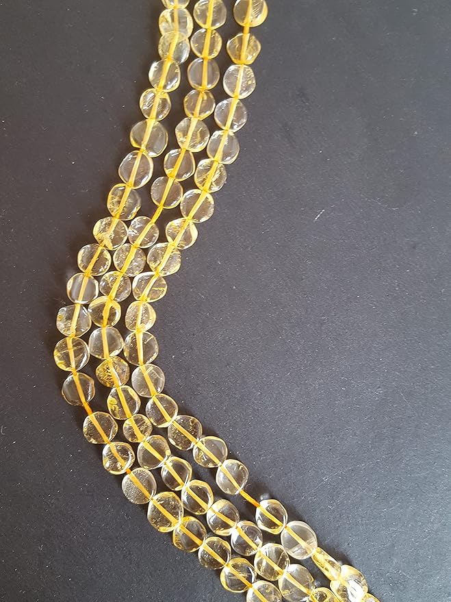 Strand featuring smooth coin shaped citrine gemstones, ranging from 6mm to 7mm, in a stunning yellow hue.