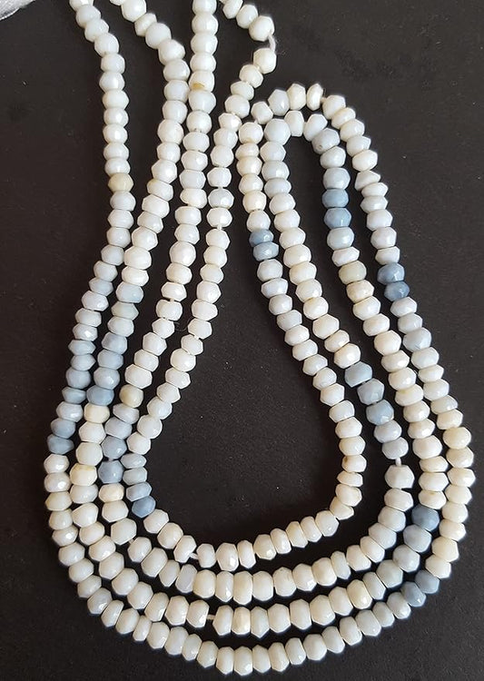 A beautiful strand of natural denim opal beads, featuring faceted rondelles, perfect for jewellery making.