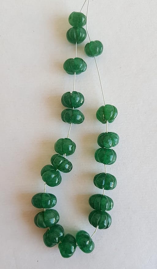 Elegant strand adorned with 3 green Emerald Carved rondelle beads, perfect for adding a pop of colour.