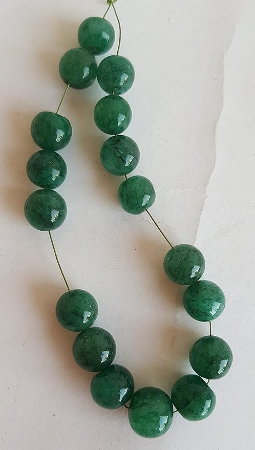 Stunning strand with 7mm to 9mmmm green Emerald smooth round beads, ideal for a stylish accessory.