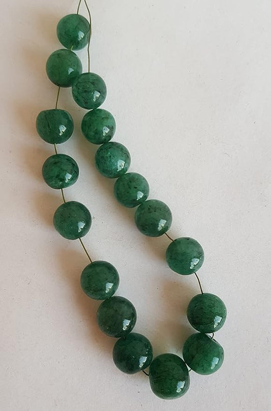 Elegant strand adorned with 7mm to 9mm green emerald smooth round beads, perfect for adding a pop of colour.
