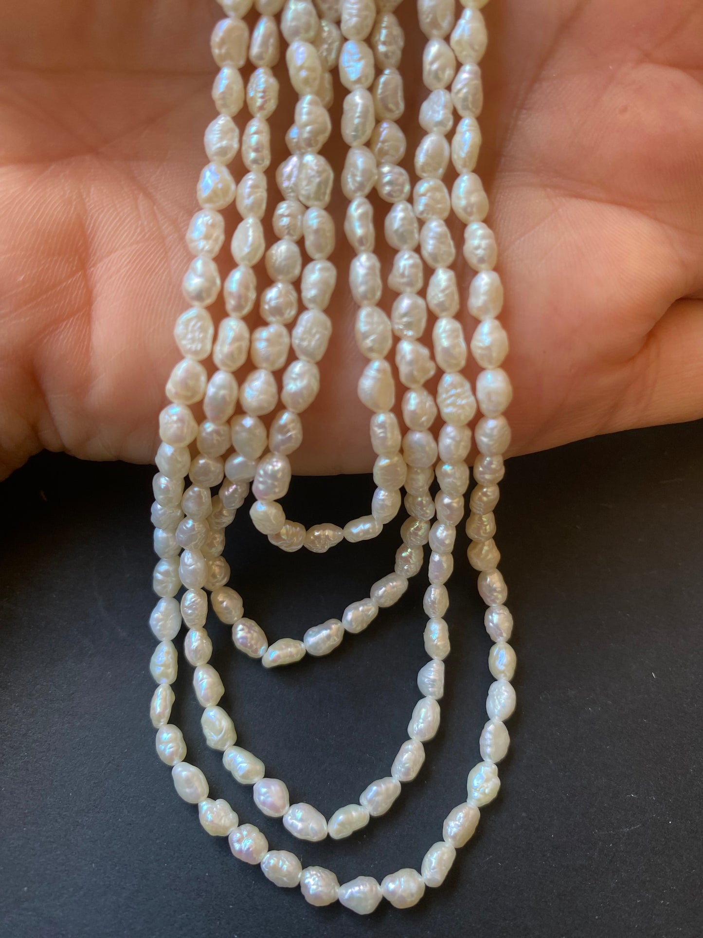 Stands made of freshwater Baroque rice pearls, with beads ranging from 3.2 to 3.7 mm in diameter.