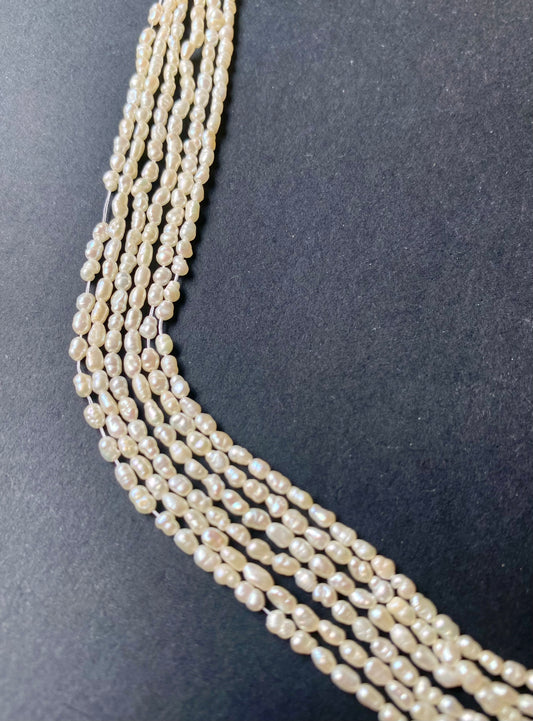 Elegant multi-strands featuring 2-2.2mm freshwater rice pearls, highlighting their natural lustre and beauty.