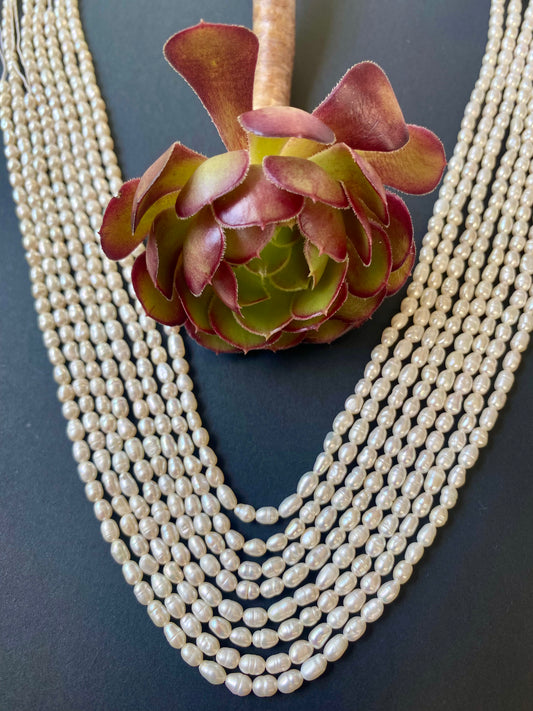 Multiple strands of 3.5mm freshwater rice pearls, perfect for adding a touch of class.