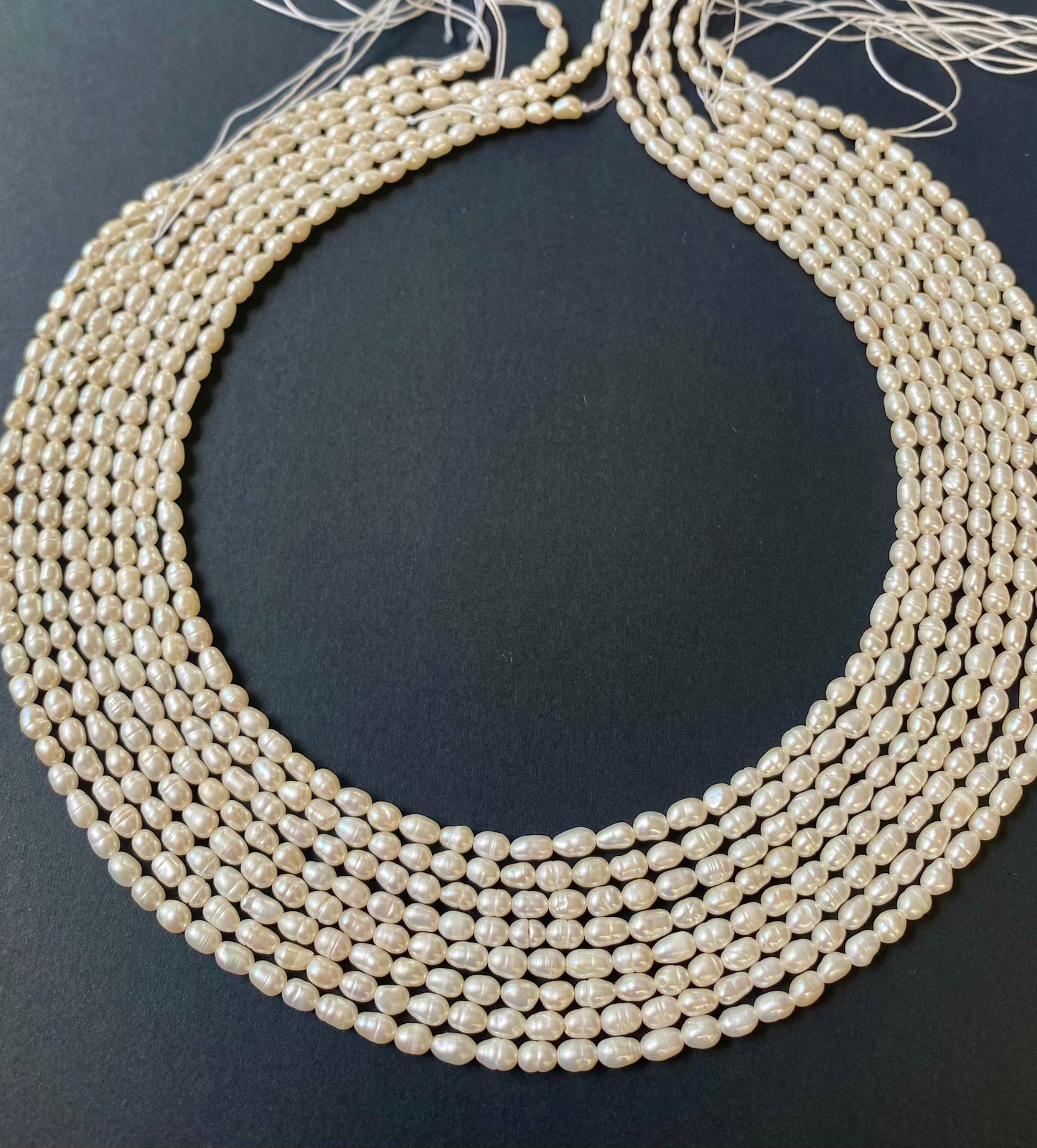 Multi-strands featuring 3.5mm freshwater rice pearls, showcasing elegance and sophistication.