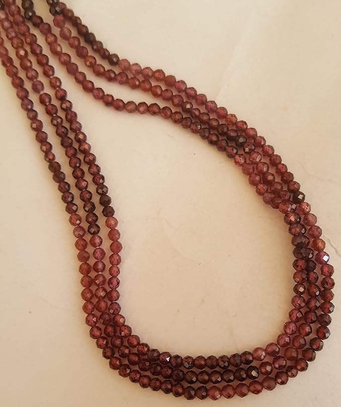 Strands featuring 2mm faceted rondelle beads in a vibrant green colour, showcasing the beauty of natural semi - precious gemstone, Garnet.