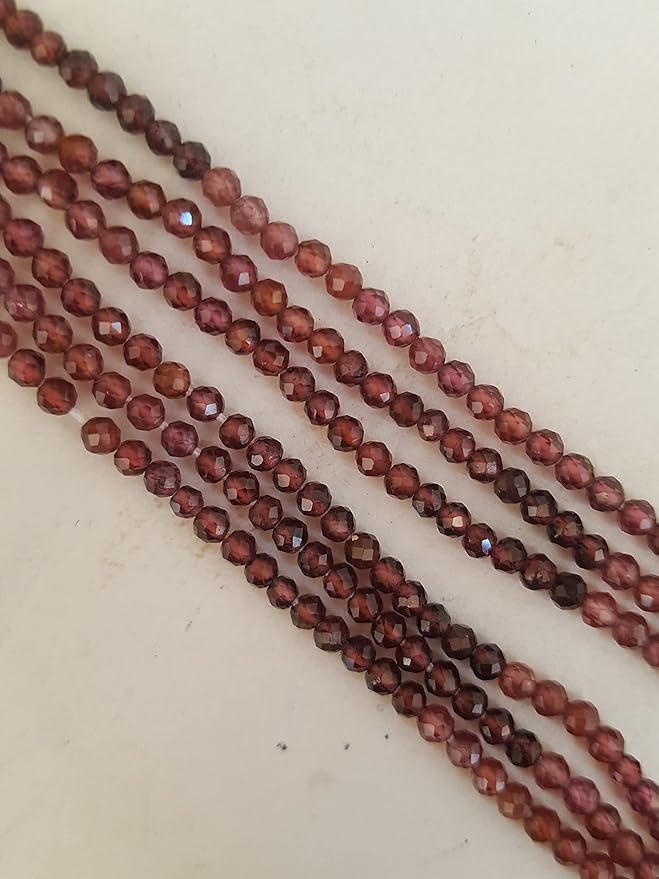 Elegant strands adorned with 2mm green Garnet faceted rondelle beads, perfect for adding a pop of colour.