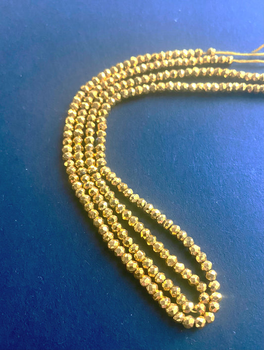 Radiant faceted rondelle beads with a brilliant metallic finish and refined shimmer.