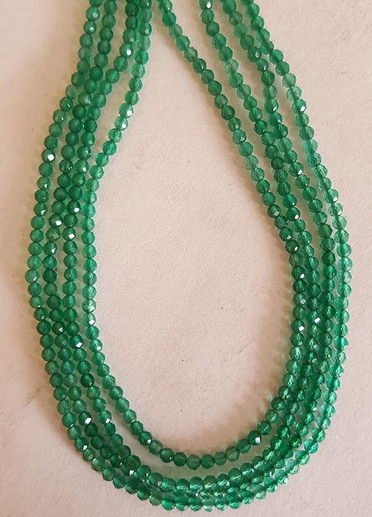 Strand featuring 2mm faceted rondelle beads in a vibrant green colour, showcasing the beauty of onyx.