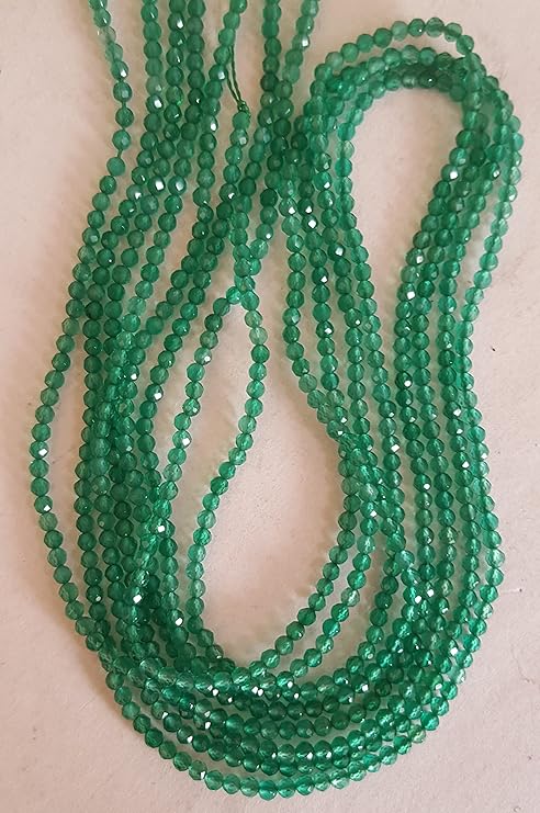 Strand featuring 2mm faceted rondelle beads in a vibrant green colour, showcasing the beauty of Onyx.