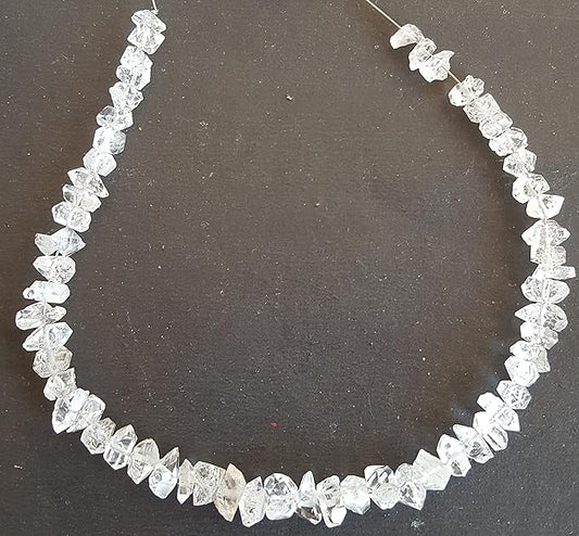 Strands featuring Herkimer Diamond gemstones, showcasing a rough, natural texture.