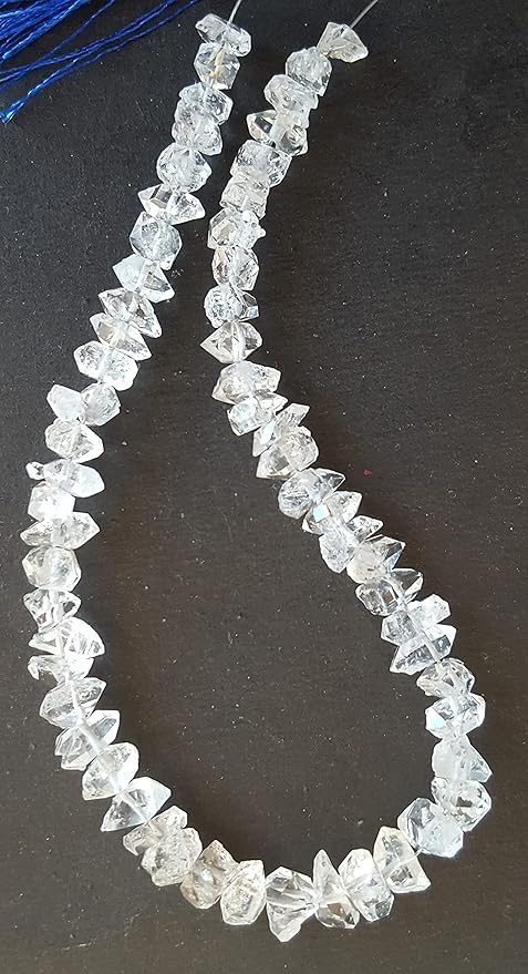 A strand crafted from rough natural Herkimer Diamond gemstone, with beads sized between 6mm and 8mm, radiating warmth and elegance.