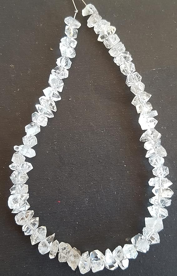 Strands featuring Herkimer Diamond gemstones, each bead measuring 6mm to 8mm, showcasing a rough, natural texture.