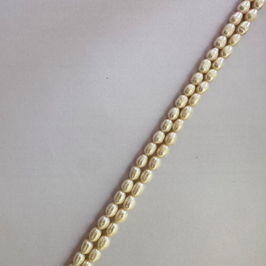 Freshwater Pearls in textured oval shape arranged on a 37cm strand with natural creamy glow.