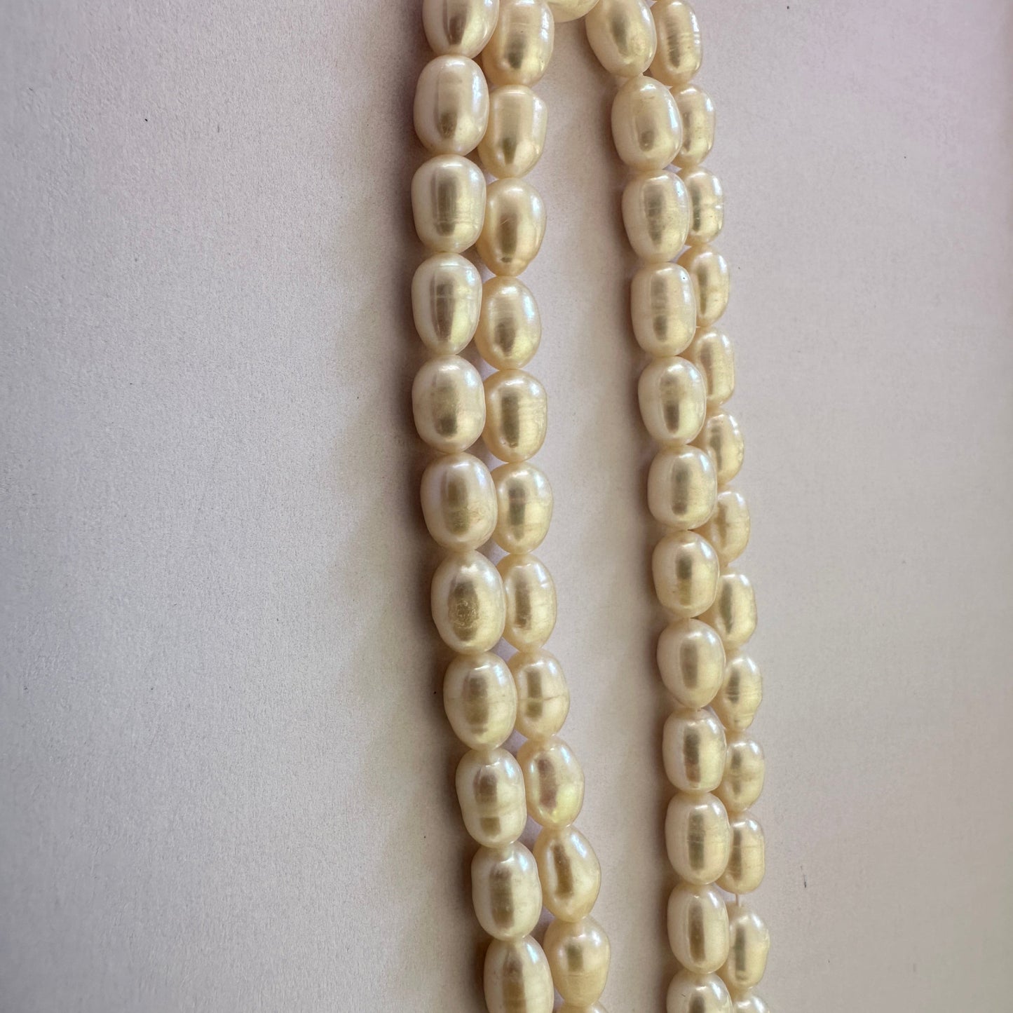 Neatly strung oval Freshwater Pearls in varying sizes with smooth finish.