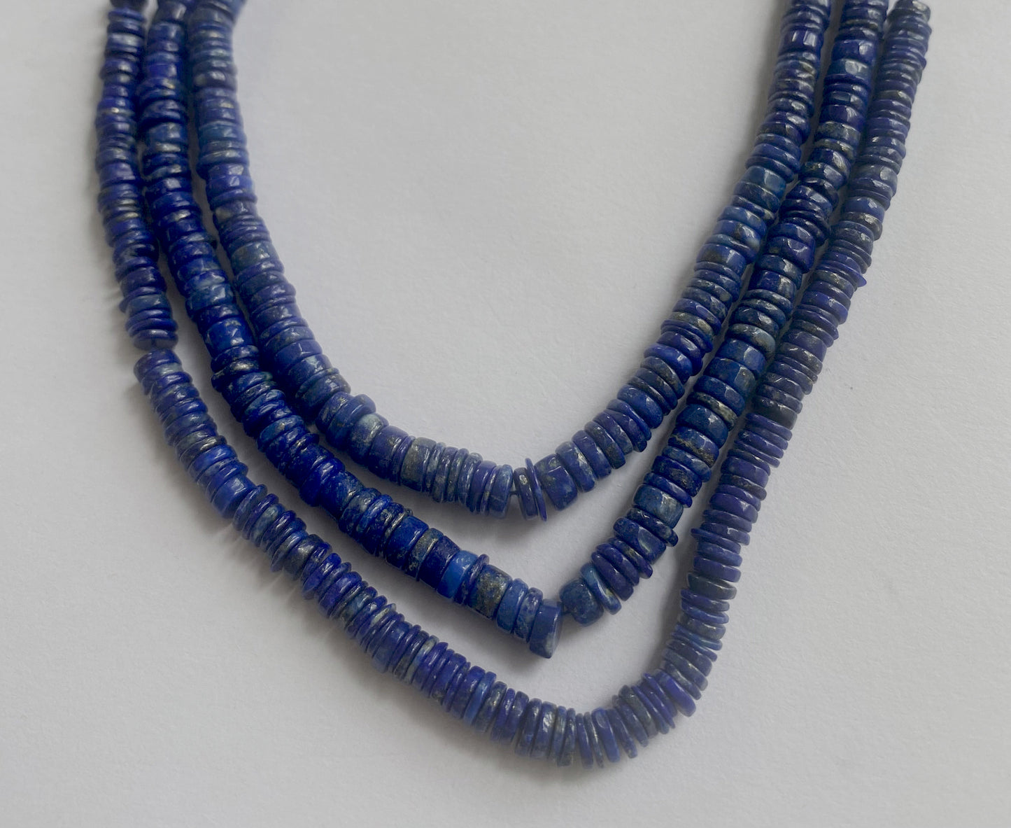 5-5.5mm or 5.5-6mm Lapis Lazuli beads featuring a high-quality finish and uniform arrangement.