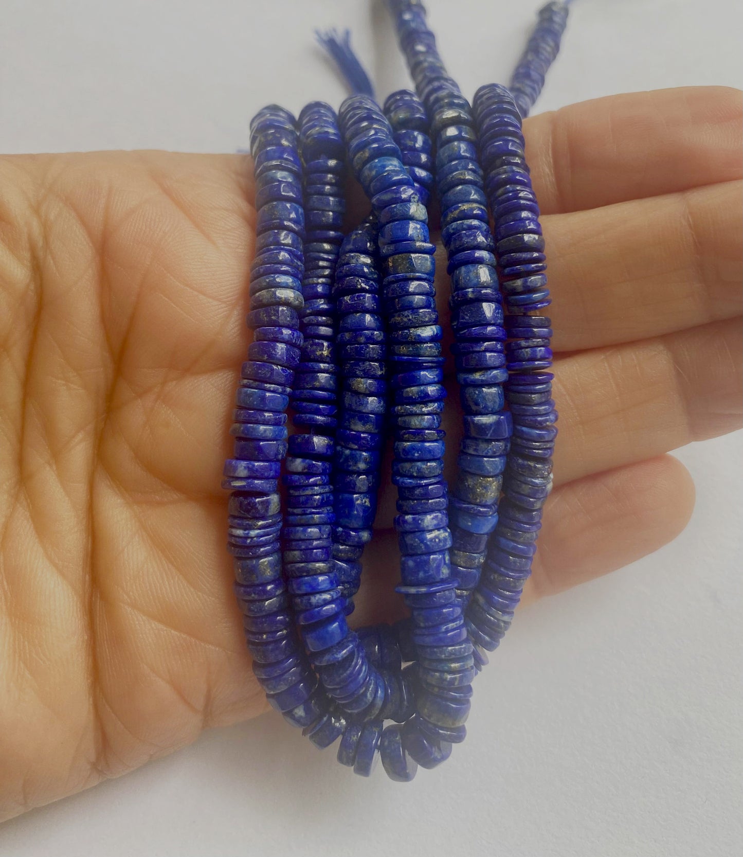 A 20cm strand of Lapis Lazuli beads with a precise 0.5mm hole for versatile use.