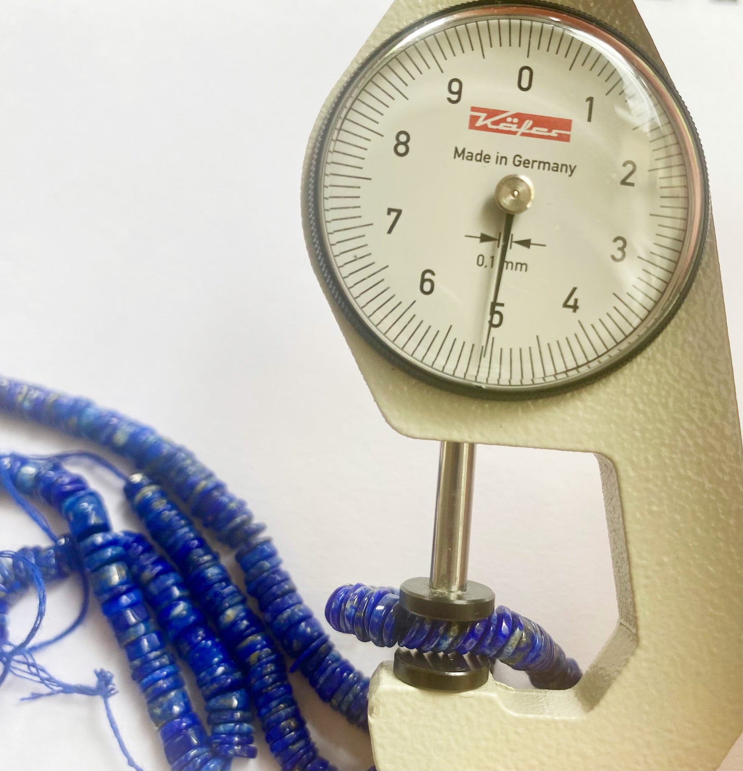 Vibrant Lapis Lazuli gemstone beads with a smooth cut, ideal for jewelry making.