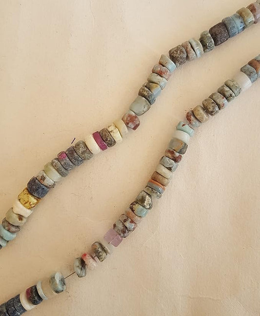 A strand crafted from natural Larimar gemstone, with beads sized between 6mm and 7mm, radiating warmth and elegance.