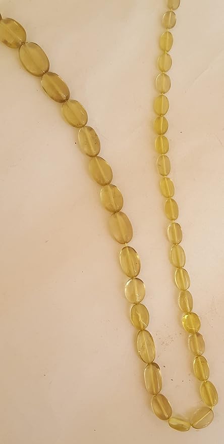 Strand featuring smooth oval lemon quartz gemstones in a stunning yellow hue.