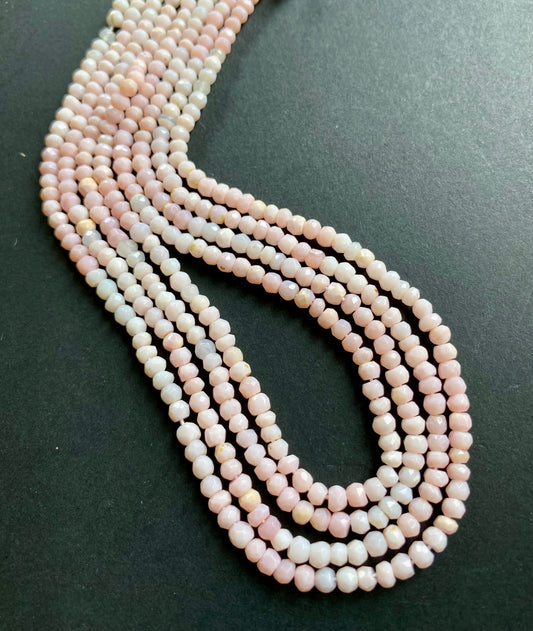 Beautiful strands of Opal gemstone beads, featuring faceted rondelles sized between 3.5mm-4mm, radiating elegance.