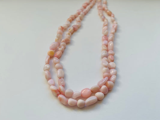 Stunning 4-5.5mm smooth opal gemstone beads, reflecting the unique charm of opals.