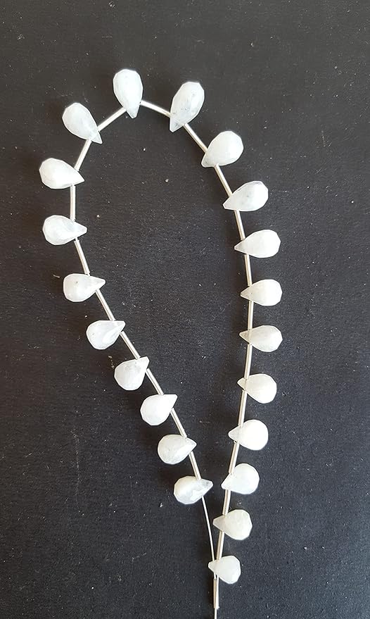 Elegant strand crafted from white gemstone beads, accented with rainbow moonstone faceted teardrop beads for added charm.