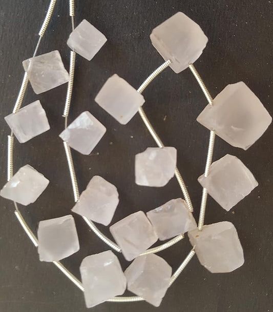 Beautiful rose quartz stones, measuring between 10mm and 12mm.