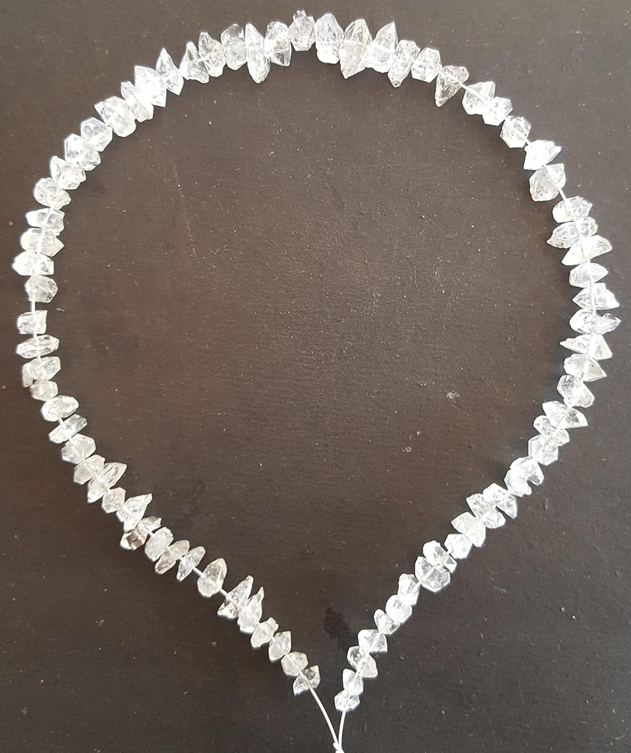 Rough Herkimer Diamonds Strand showcasing 6-8mm beads in a stunning design.