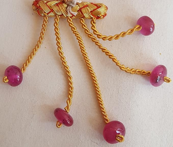 Elegant strand adorned with 8mm ruby smooth rondelle stones, showcasing a rich pink colour.