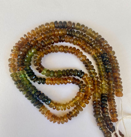 Multi-strands made of 4.5-5mm tourmaline beads, displaying a stunning array of colours and textures.