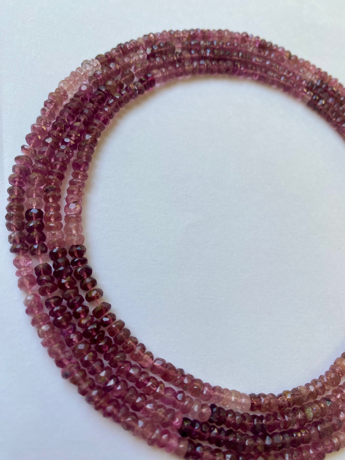 Multiple strands of pink tourmaline beads, faceted rondelles sized 3.8-4.0mm.