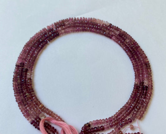 Several strands of pink tourmaline rondelle beads, each measuring 3.8-4.0mm.