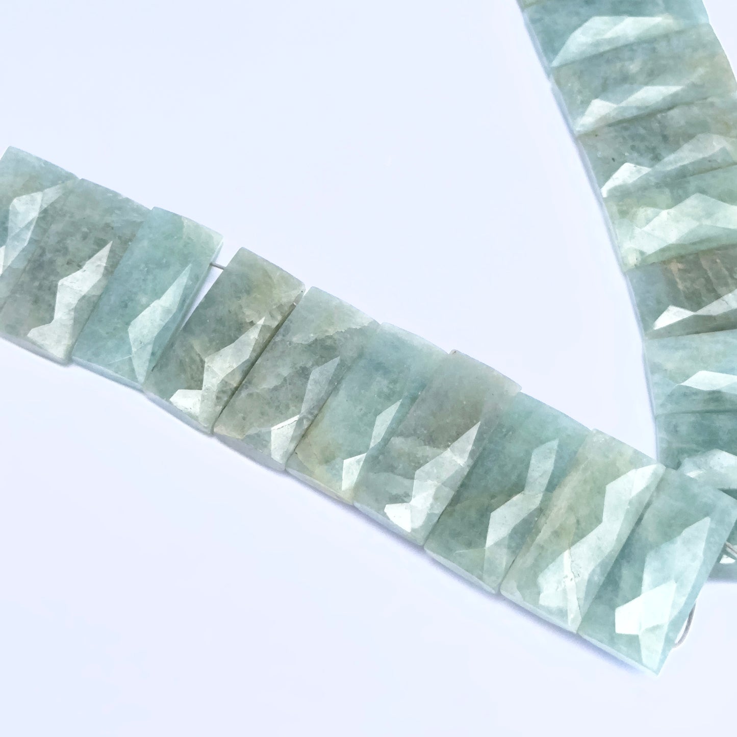 Natural gemstone beads in Amazonite rectangle cut, ideal for DIY jewellery and artisan designs.