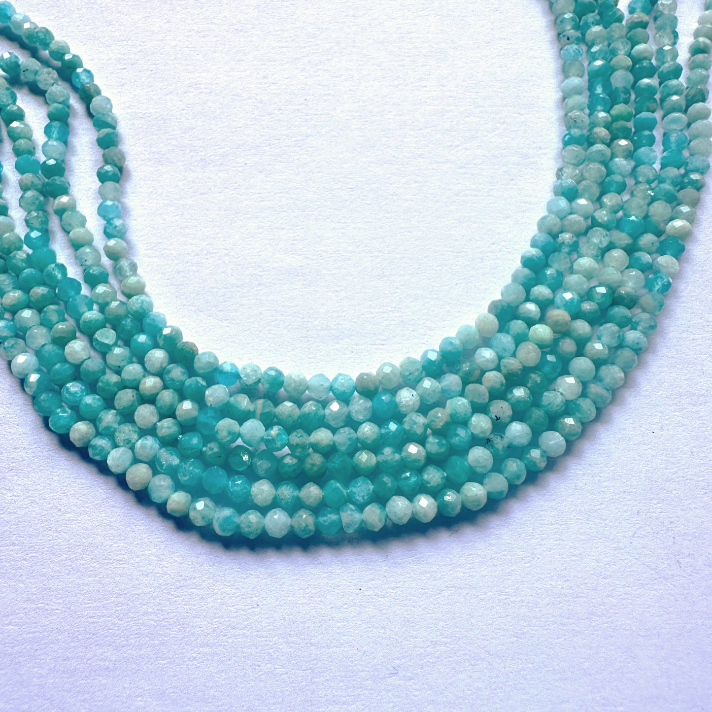 Premium Amazonite strand featuring 2.7mm faceted rondelle beads with soft colour and high clarity.