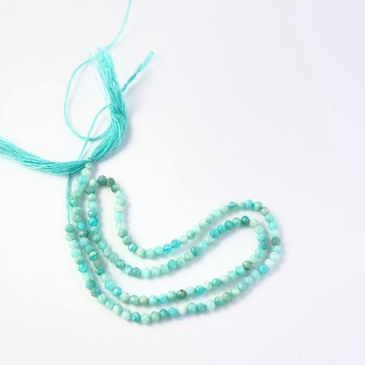 Amazonite faceted rondelle beads in a long strand, displaying calming tones and refined craftsmanship.